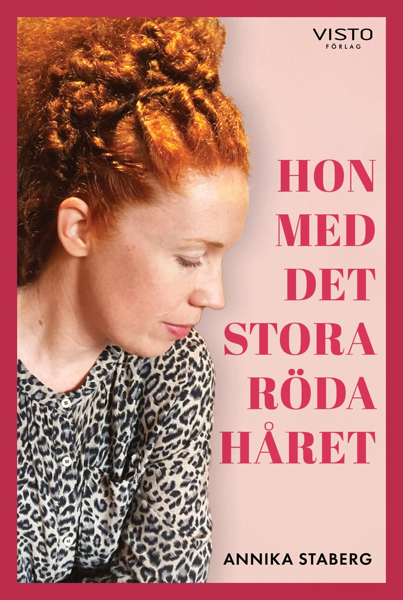 Hon med det stora röda håret